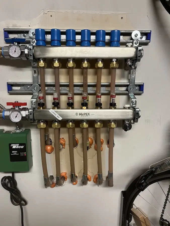 Plumber performing Water Heater Repair at a residential property in Little Silver